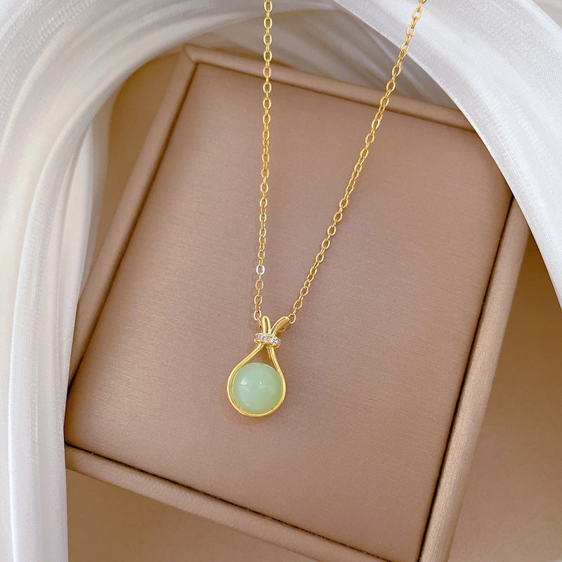 Collar con colgante de bolsa de la suerte minimalista para mujer, cadena de serpiente de acero inoxidable con detalles de diamantes de imitación completos y diseño de animal del zodíaco