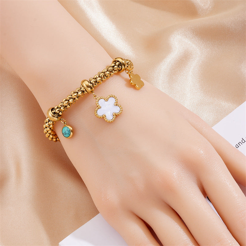 Bracciale alla moda vintage in acciaio inossidabile placcato oro con ciondolo a forma di fiore, luna, stella e turchese per donna