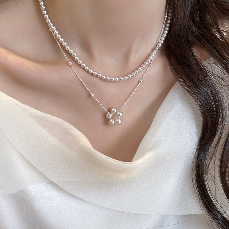 Elegante collana di perle in stile francese con motivo floreale a perline rotonde, catena clavicola placcata oro, gioielli da donna vintage minimalisti per l'uso quotidiano