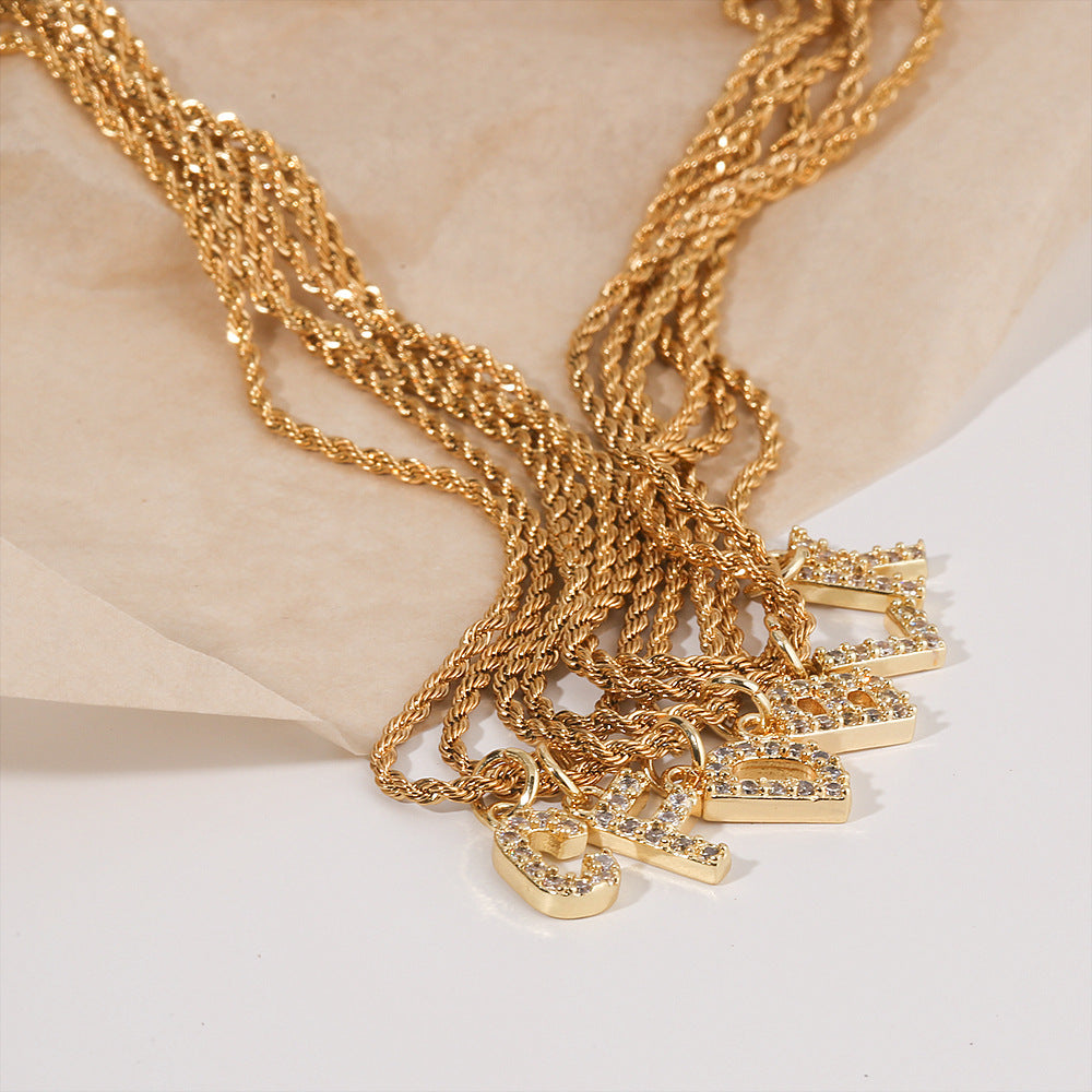 Collar con colgante de letra para mujer, minimalista, de moda, cadena trenzada de acero inoxidable con baño de oro e incrustaciones de circonita