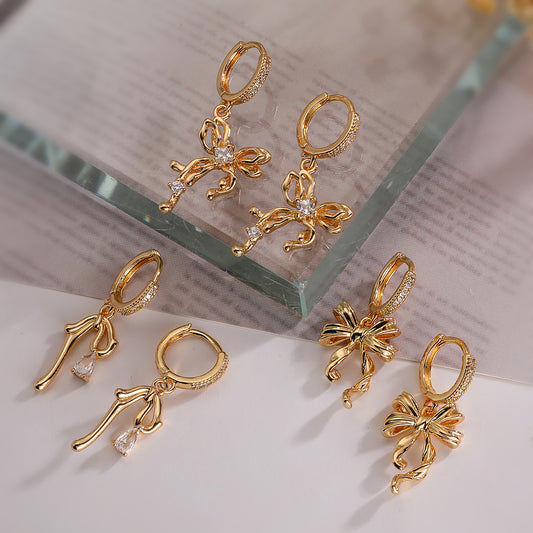 Orecchini da donna minimalisti in rame a forma di fiocco con placcatura in oro vero e intarsio di zirconi