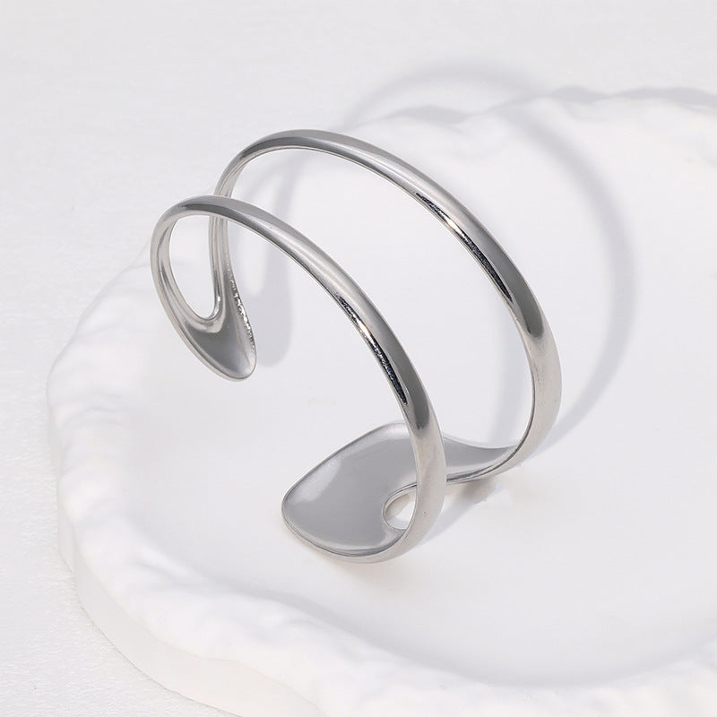 Minimalist Stainless Steel Adjustable Bracelet for Women with 18K Gold Plating Titanium Steel Finish Geometric Ring Design