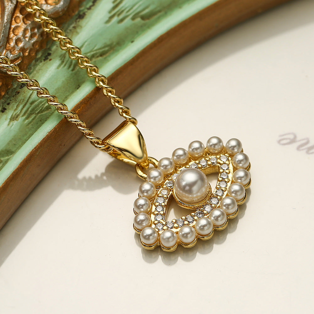 Minimalist Geometric Evil Eye Pendant Necklace for Women with Zircon and Pearl Accents on Copper Chain