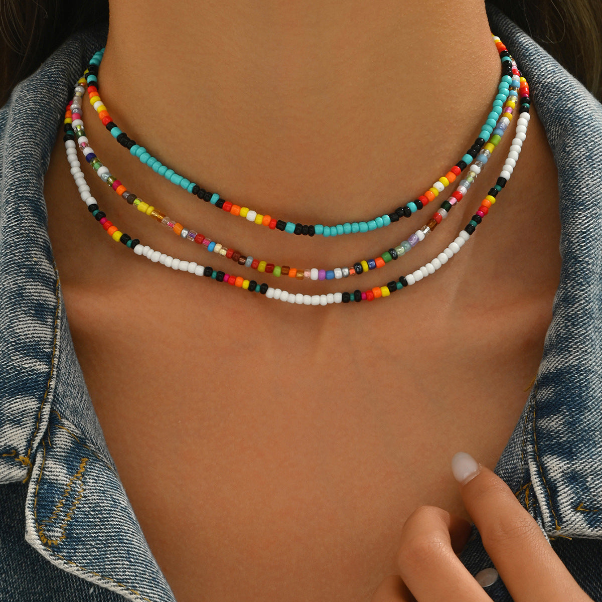 Collar largo de clavícula con múltiples capas geométricas para mujer, con cuentas de semillas coloridas tejidas a mano y diseño elíptico lineal