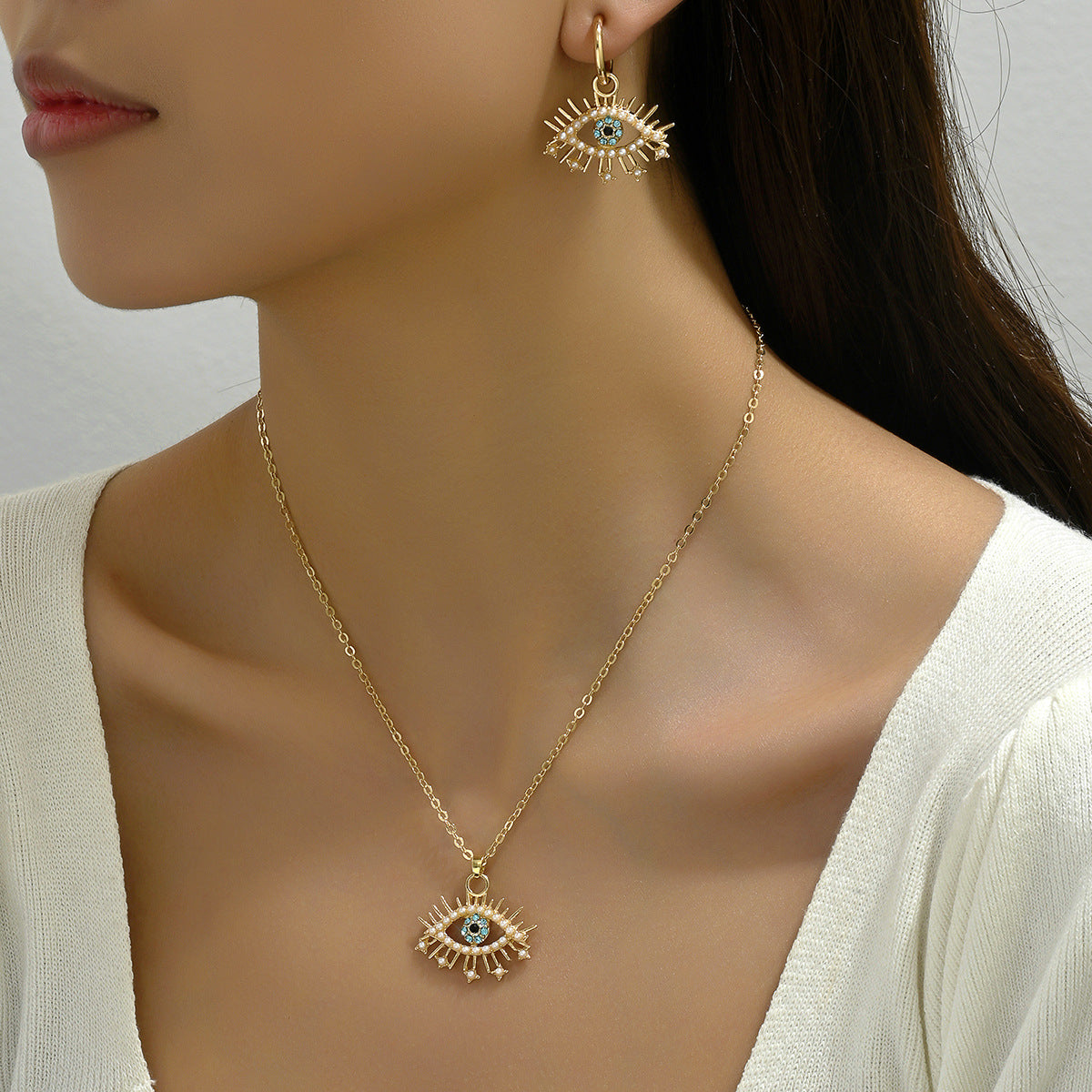 Conjunto de collar con colgante minimalista de ojo de ángel con incrustaciones de pedrería en aleación para mujer, cadena larga de clavícula y pendientes a juego