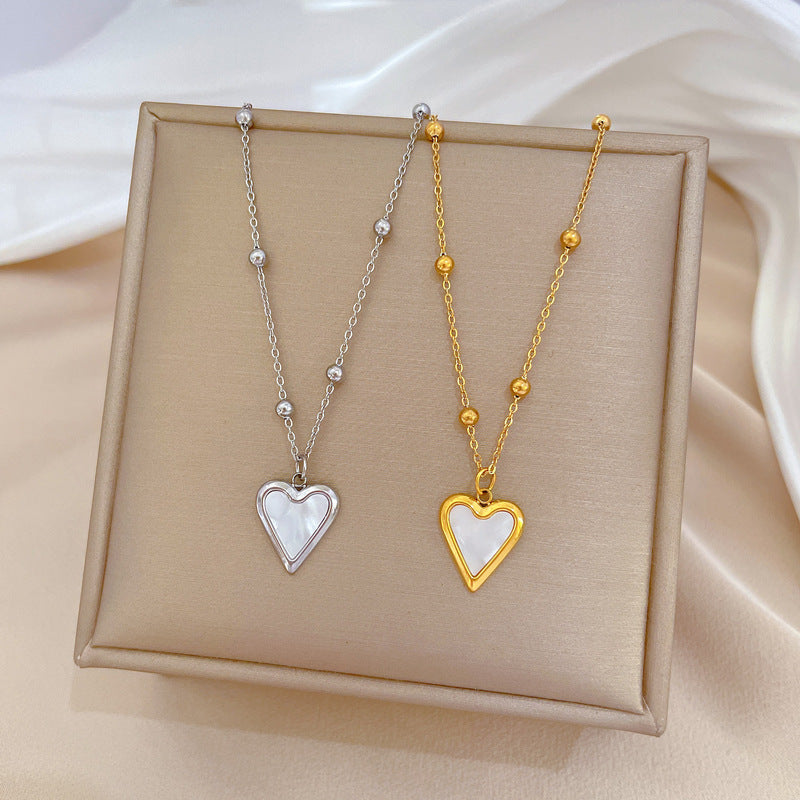 Collana con ciondolo a cuore minimalista in acciaio al titanio placcato oro per donna e uomo, stile medaglione a catena irregolare