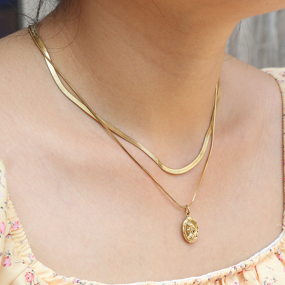 Collana a doppia catena serpente minimalista da donna in acciaio al titanio placcato oro 18K