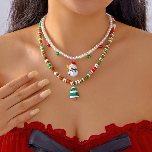Collar de Navidad hecho a mano de arcilla polimérica para mujer con colgante de muñeco de nieve, reno y copo de nieve en cadena de cuentas