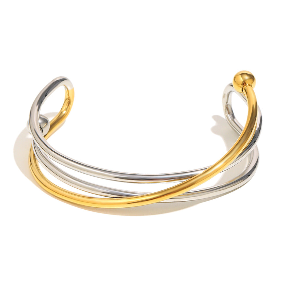 Bracciale da donna in acciaio inossidabile placcato oro 18 carati con design geometrico a linea incrociata, stile minimalista