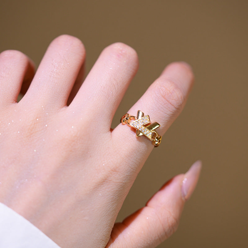 Minimalist X-Shaped Micro-Paved Zircon Stud Bracelet and Ring Set with Gold-Plated Copper Adjustable Bangle for Women