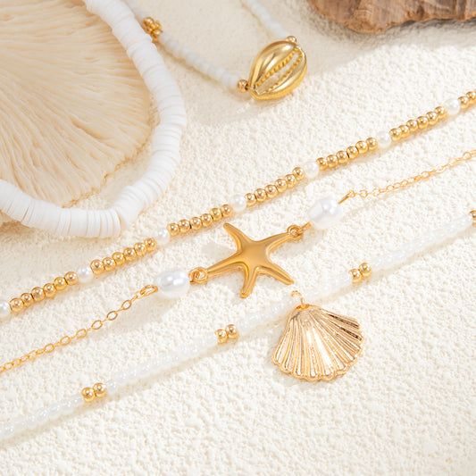 Tobillera elástica de cuentas con colgante de concha geométrica estilo bohemio con motivos de perlas y estrellas de mar