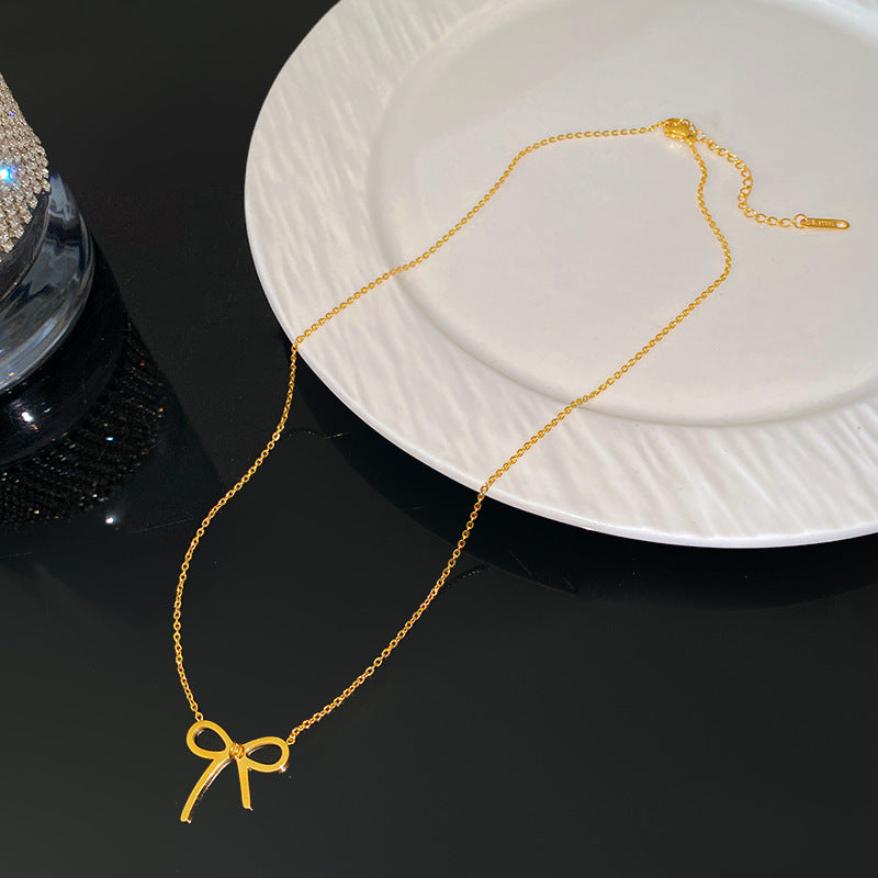 Minimalist Luxury Geometric Plated Titanium Steel Bowknot Pendant Necklace for Women