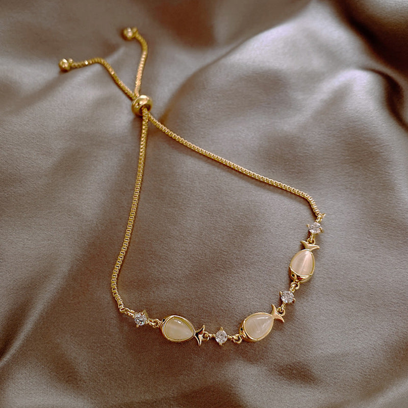 Bracciale da donna in lega di ottone placcato, con zirconi cubici micro-incastonati, rotondo, floreale e minimalista