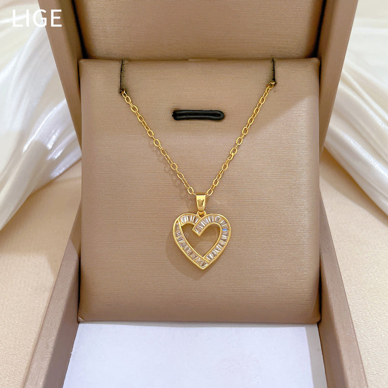 Set di collana e orecchini a cuore geometrici in acciaio al titanio di lusso con strass e zirconi da donna