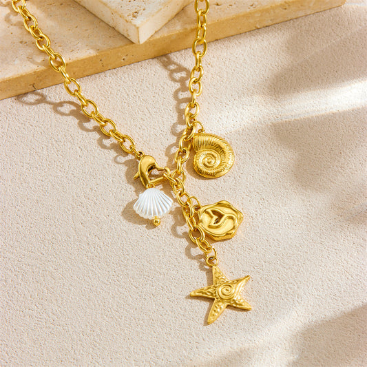 Collana con ciondolo a forma di coda di sirena con stelle marine e conchiglie stile Ins in acciaio inossidabile placcato oro con catena a maglie per donna