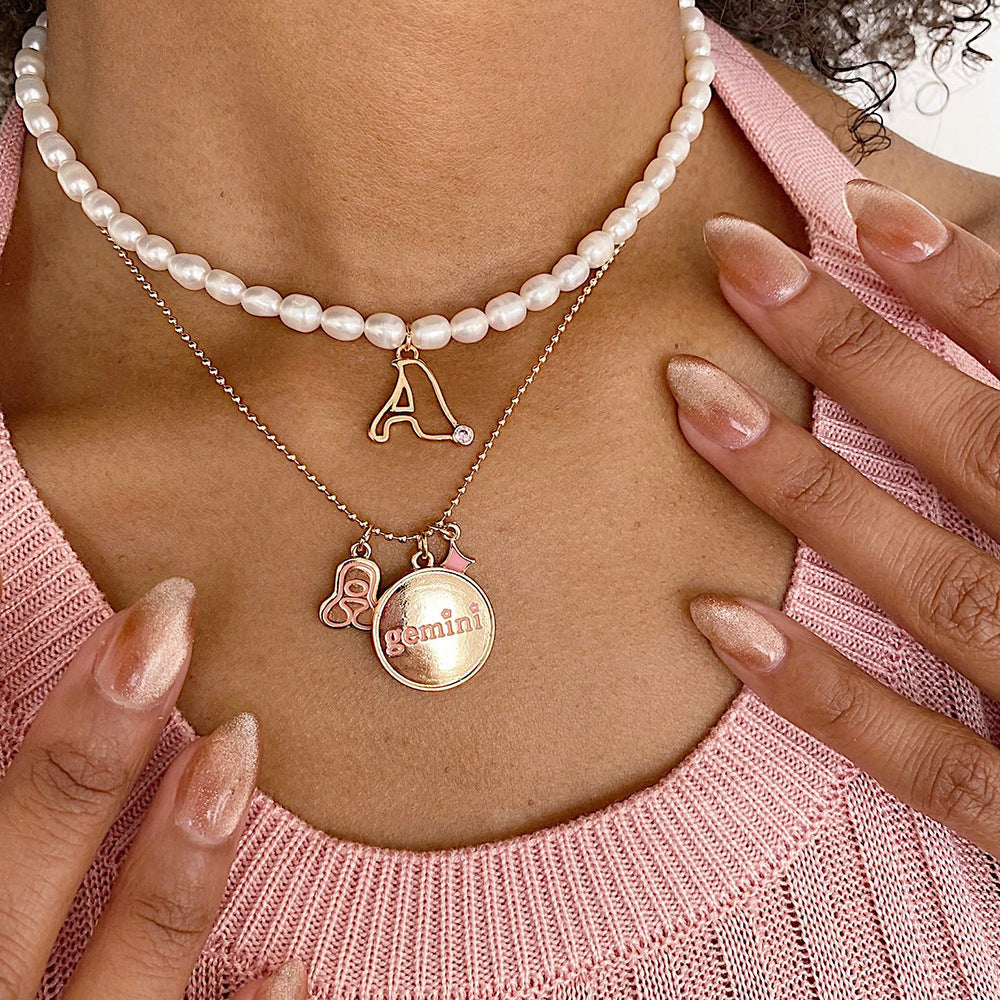 Sweet Stainless Steel Letter Pendant Necklace with Pearl and Cubic Zirconia