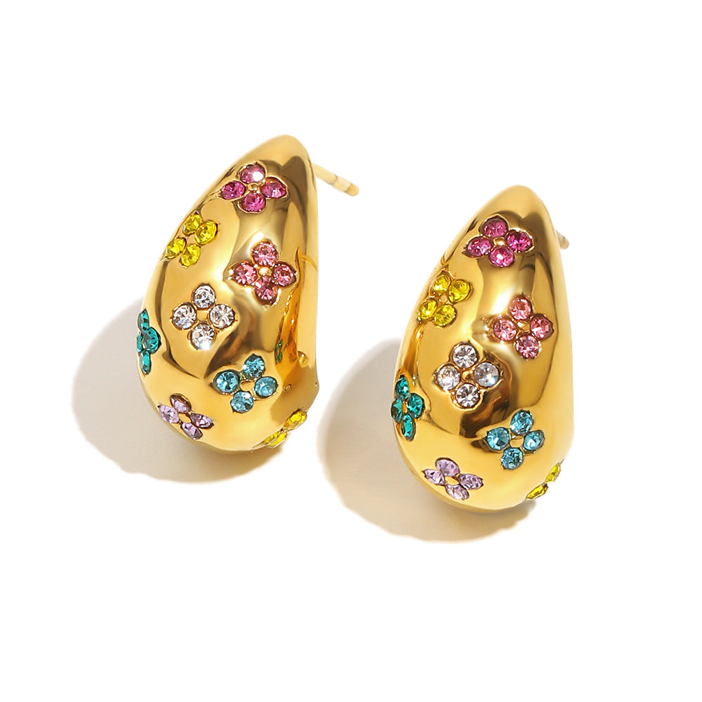 Orecchini a perno geometrici minimalisti alla moda in acciaio inossidabile con placcatura in oro 18 carati e design floreale cavo accentato con strass