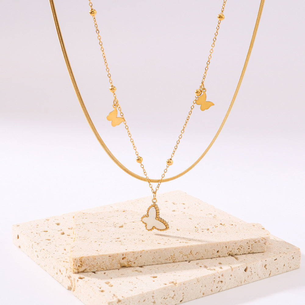 Collana Farfalla Minimalista a Doppio Strato con Catena in Acciaio Inossidabile e Ciondolo in Abalone Bianco