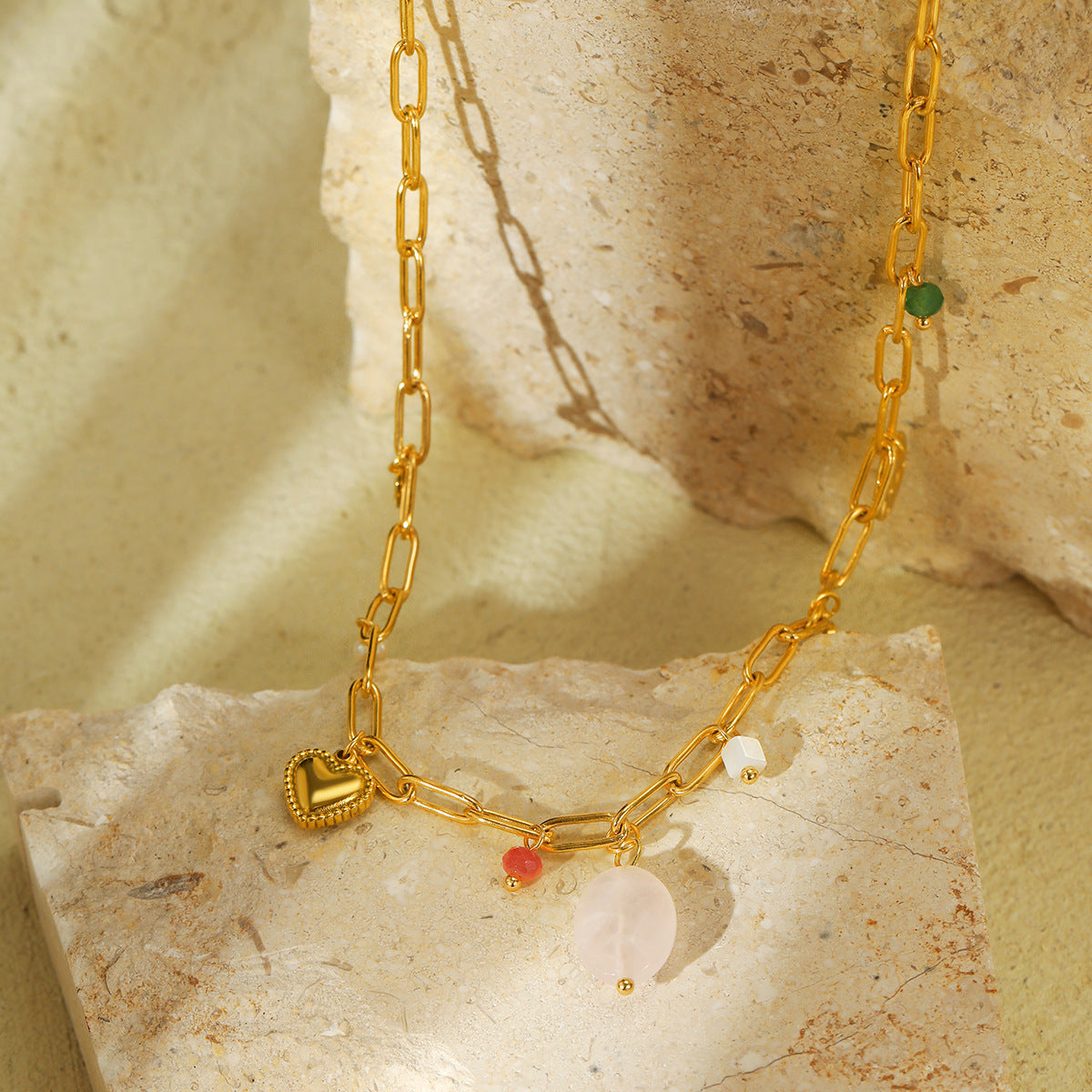 Fashionable Heart-Shaped Titanium Steel Necklace for Women with Natural Pearl Accents and Electroplated Finish