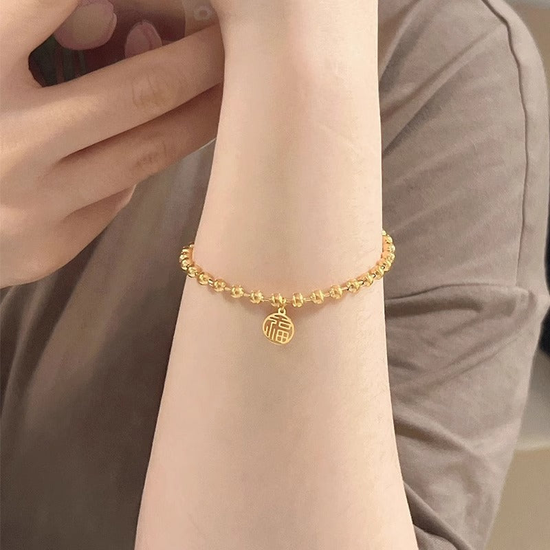 Original Design Leaf-Shaped Titanium Steel Bracelet with 18K Gold Plating for Women, Hypoallergenic Round Bead Wristband