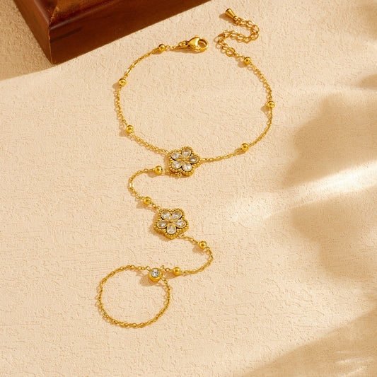 Minimalist Elegant Gold Plated Stainless Steel Floral Rhinestone Hand Chain with Tassel
