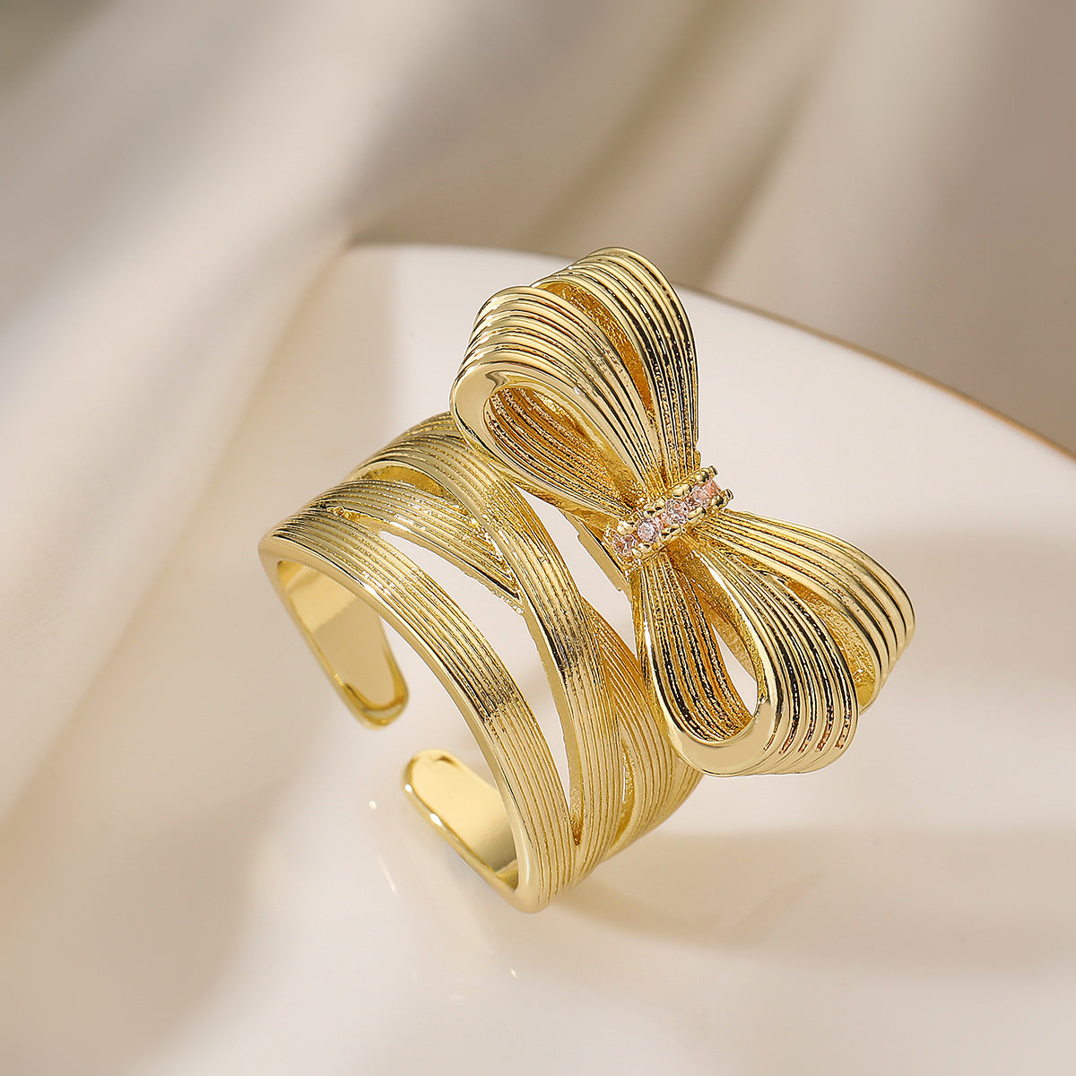 Fashionable Bowknot-Shaped Ring for Women with Brushed Copper Base and 18K Gold Plating, Geometric Design, Adjustable Band