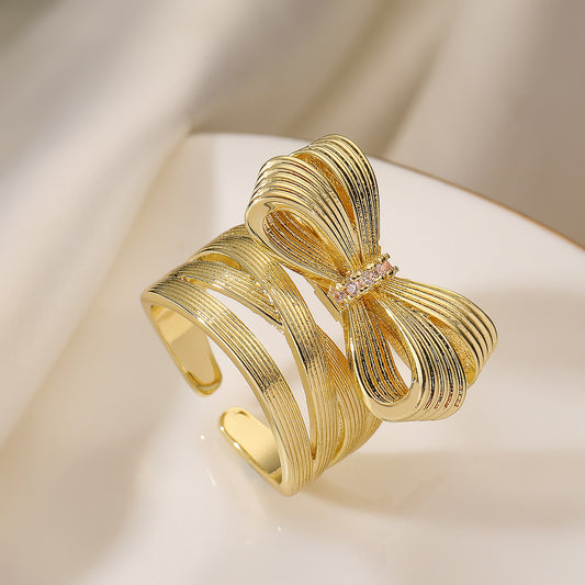 Fashionable Bowknot-Shaped Ring for Women with Brushed Copper Base and 18K Gold Plating, Geometric Design, Adjustable Band