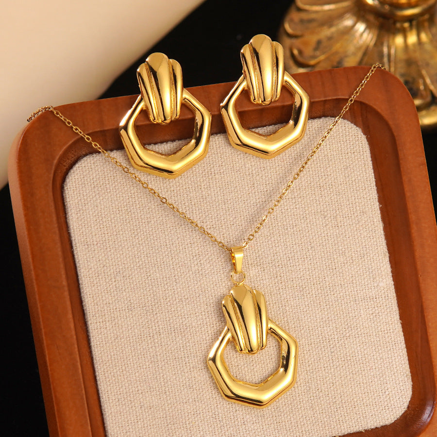 Conjunto de joyas de acero inoxidable con baño de oro minimalista con colgante de corazón floral y lazo en cadena para mujer