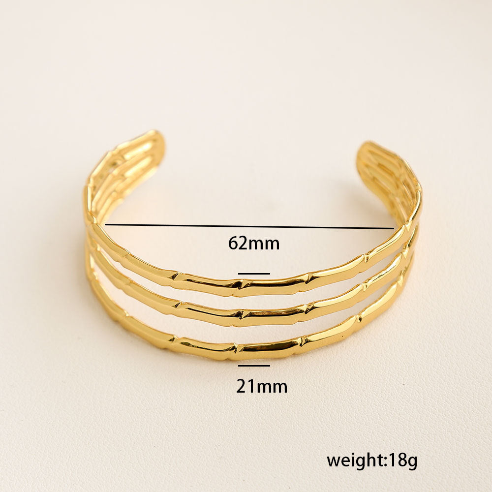 Bracciale Minimalista Ispirato alla Francia in Acciaio Inossidabile con Trafori a Motivi Floreali di Foglie e Girasoli
