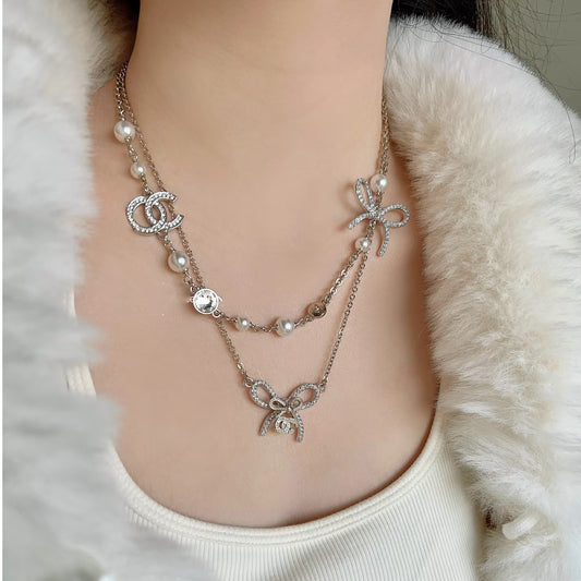 Sweet Elegant Letter Butterfly Gold Plated Brass Necklace with Pearl and Crystal Inlay for Women