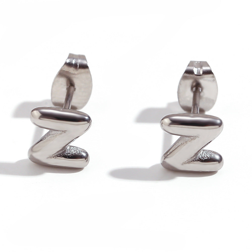Orecchini a perno da donna con lettera geometrica moderna minimalista in acciaio al titanio placcato oro 18K