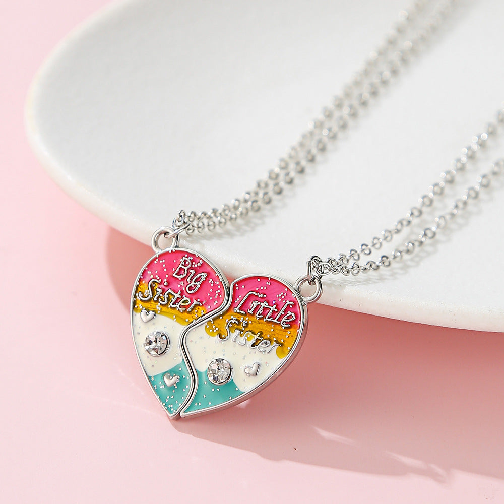 Precioso collar de aleación con forma de corazón y acabado esmaltado para niños, diseño de cadena cruzada con detalles de diamantes de imitación
