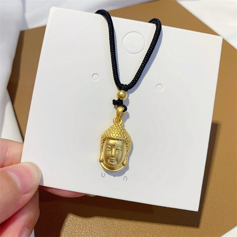 Collana Minimalista Geometrica a Ciondolo Buddha in Acciaio al Titanio Placcato Oro con Cordino Nero