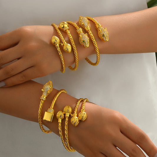 Juego de brazaletes abiertos de lujo con forma de serpiente geométrica para mujer, hechos de aleación de latón con incrustaciones de diamantes de imitación