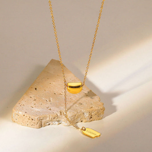 Collar con colgante semiredondo geométrico de diseño original en acero titanio con chapado al vacío de oro de 18 quilates para mujer y hombre