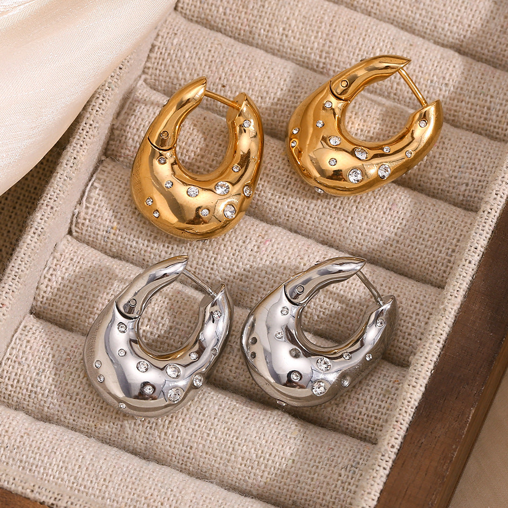 Orecchini a perno geometrici alla moda in acciaio inossidabile con placcatura in oro 18K e design a stella irregolare attorcigliata da donna