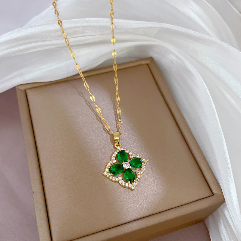 Luxury Titanium Steel Micro-Paved Zircon Four-Leaf Clover Necklace for Women with Gold-Plated Copper Pendant and Adjustable Chain