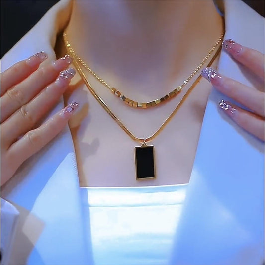 Elegante collar minimalista de acero de titanio con forma de gota de agua y cadena de serpiente para mujer, hipoalergénico y resistente a la decoloración