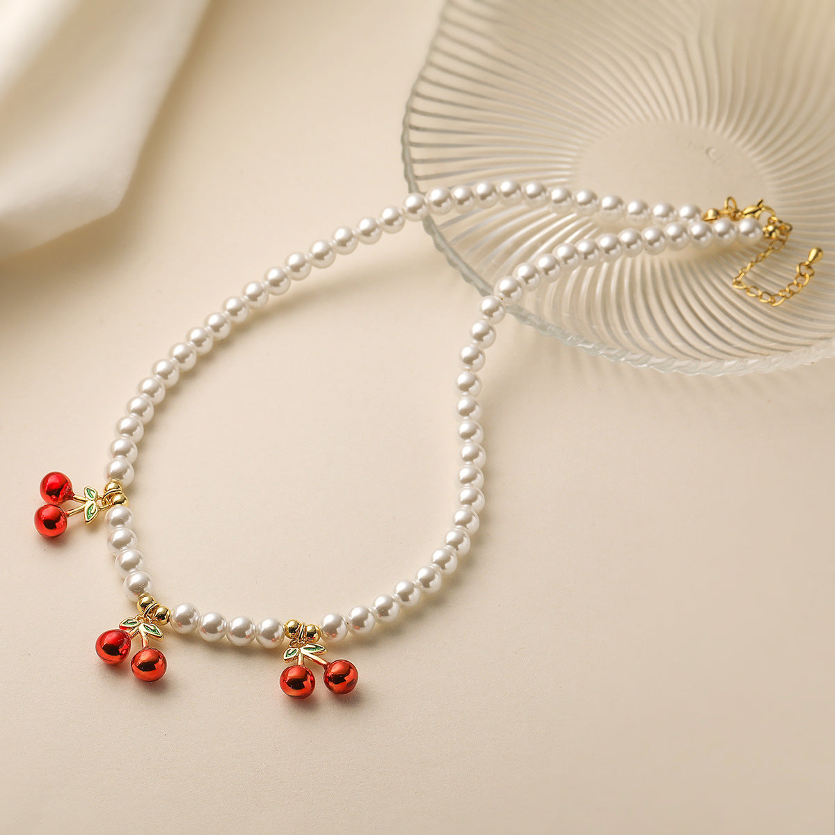 Minimalist Cherry-Shaped Pendant Necklace Set with Copper Base Plated in 18K Gold and Enamel Finish, Featuring Zircon Inlay and Irregular Design for Women