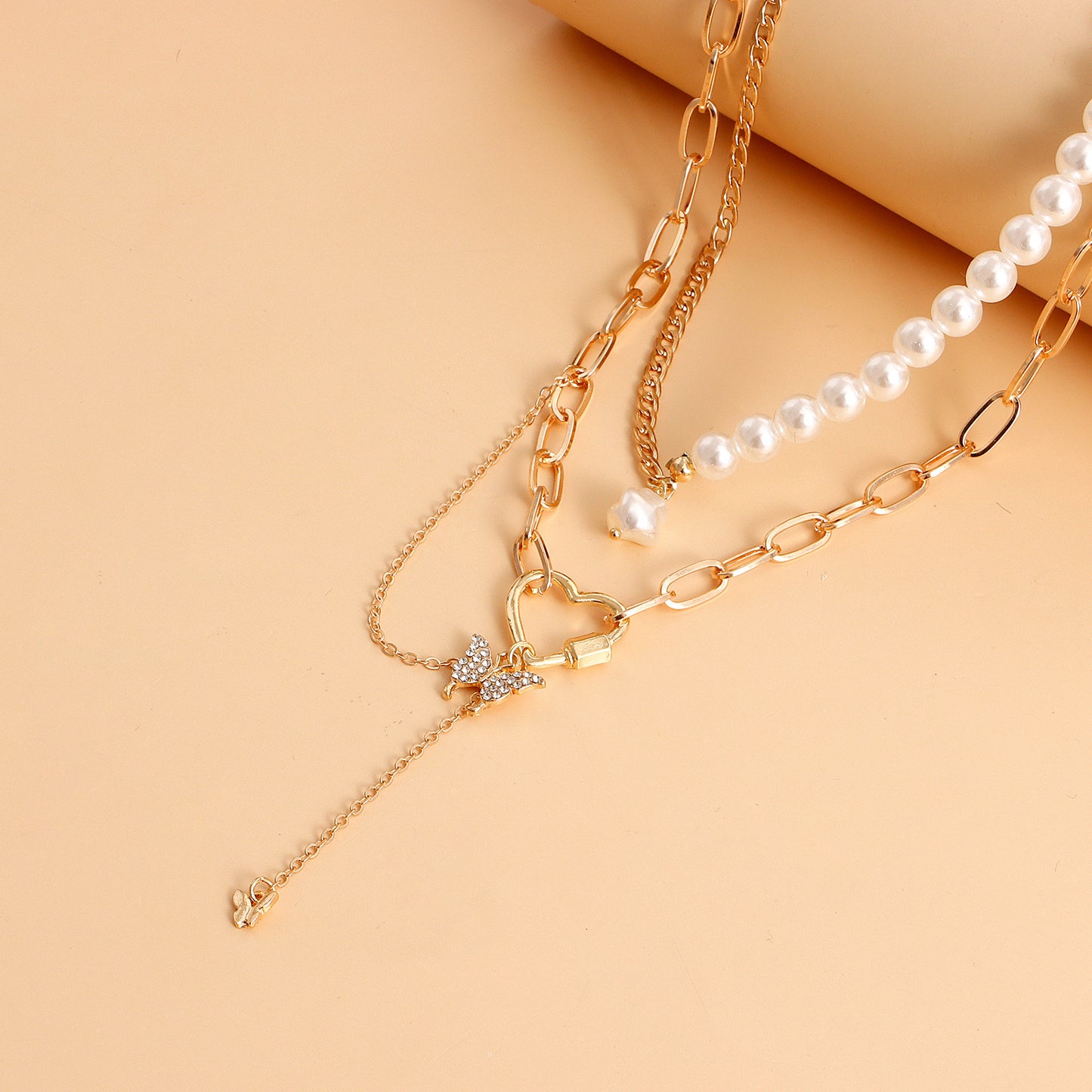 Retro Rustic Geometric Heart and Butterfly Pendant Necklace with Pearl-Like Beaded Chain in Alloy with Plating Finish