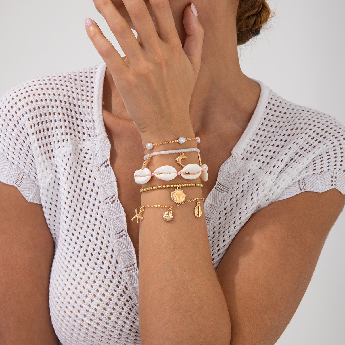 Bracciale in lega stile bohémien con stelle e forme geometriche, ciondoli a delfino e stella per donna, gioielli estivi da spiaggia galvanizzati