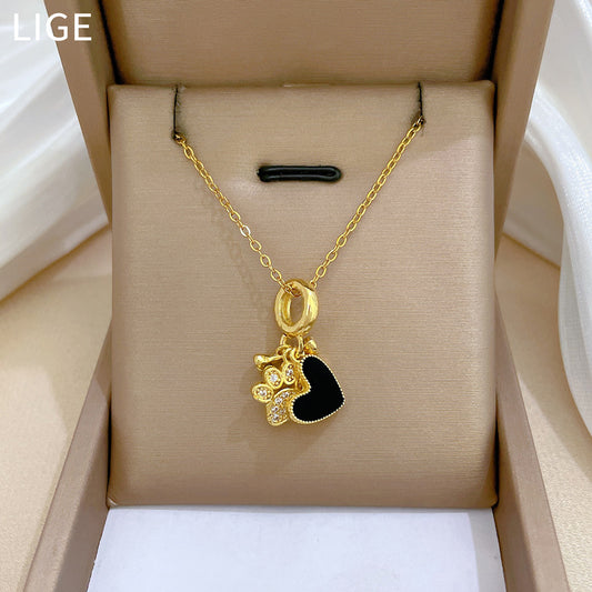 Collar de lujo de acero inoxidable con forma de corazón, colgante de huella de perro e incrustaciones de diamantes de imitación para mujer