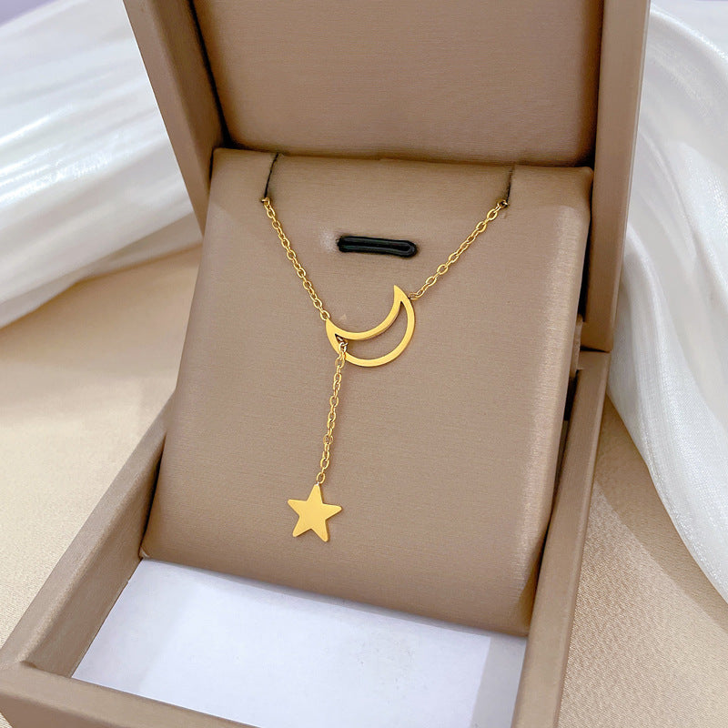 Collana girocollo minimalista a stella e luna geometriche in acciaio al titanio con intarsio di strass da donna