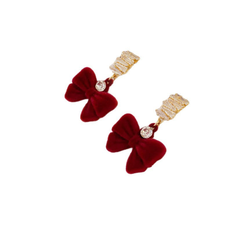 Orecchini di lusso a fiocco con cuore e motivo floreale in lega con intarsio di strass e perni in argento 925