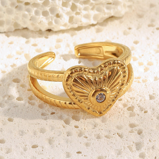 Anillo minimalista de acero inoxidable con forma de corazón y baño de oro de 18 quilates para mujer
