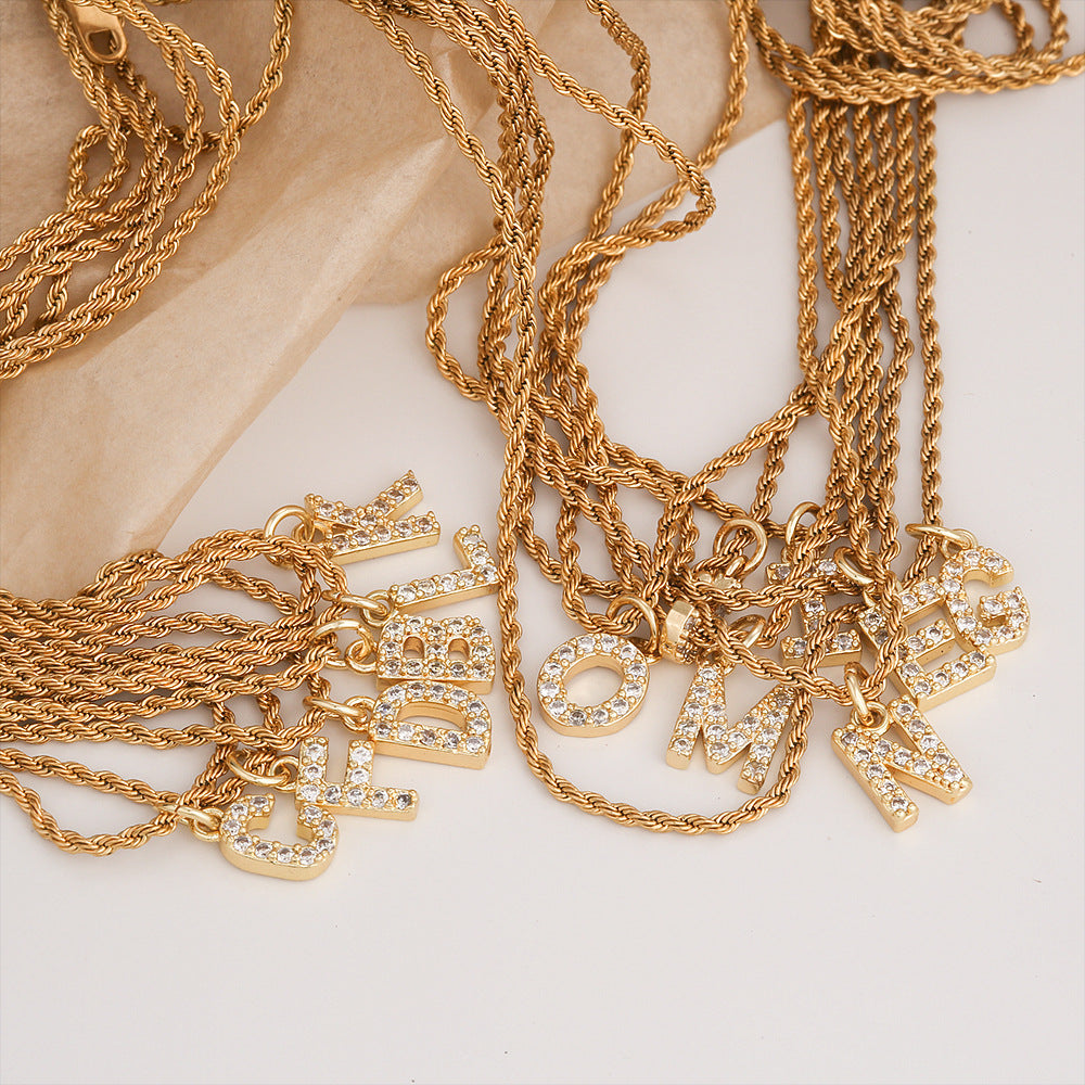 Collar con colgante de letra para mujer, minimalista, de moda, cadena trenzada de acero inoxidable con baño de oro e incrustaciones de circonita