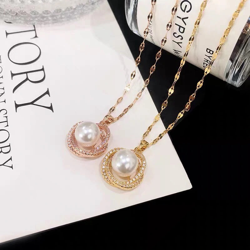 Geometric Pendant Necklace in Titanium Steel with 18K Gold Plating, Micro-Paved Rhinestones, Pearl Accents, and Wavy Chain