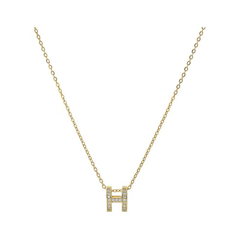 Collana da donna lussuosa e minimalista in acciaio al titanio con lettera H, tono freddo, con finitura placcata e catena a serpente