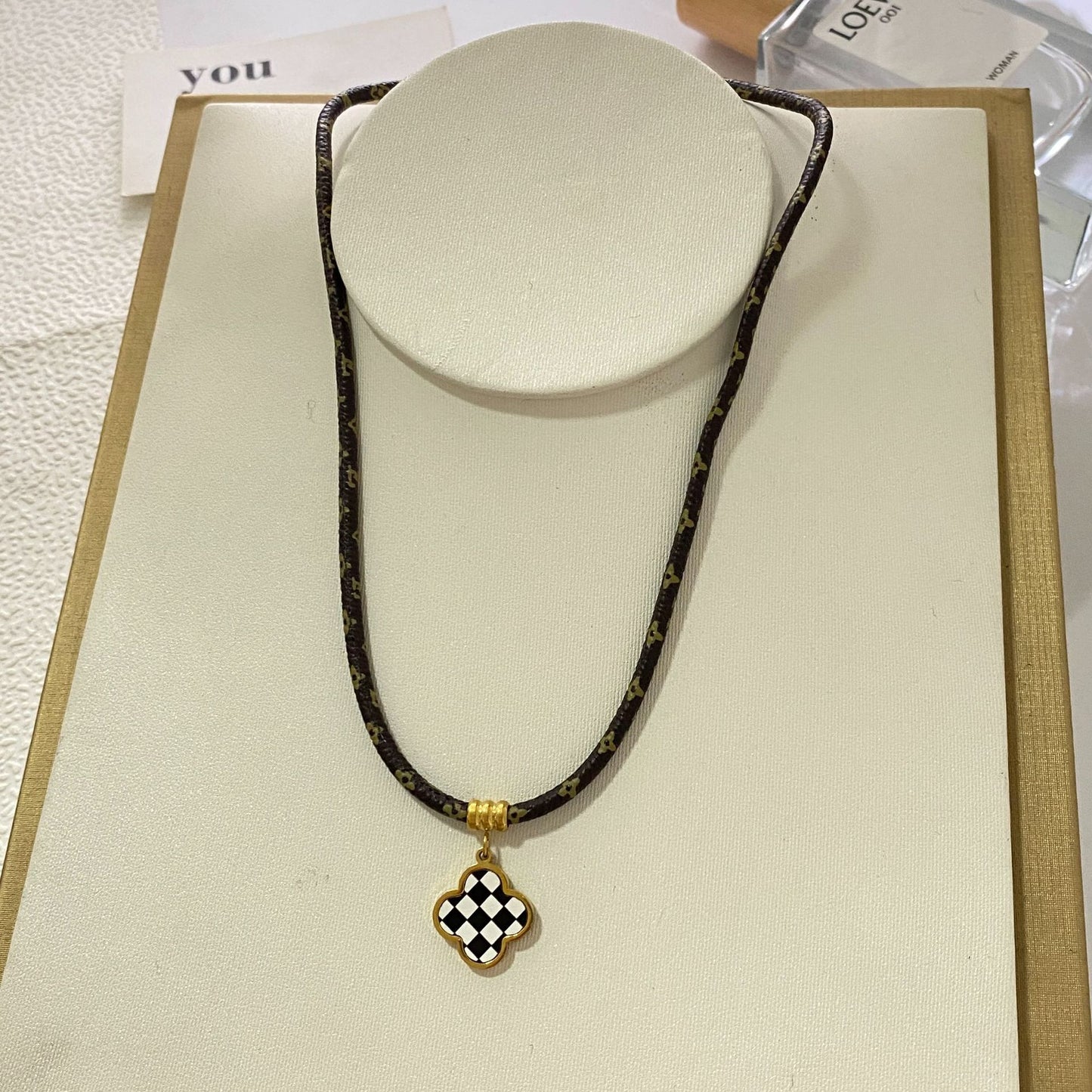 Fashion Minimalist Luxury Gold Plated Titanium Steel Black and White Checkered Clover Necklace for Unisex