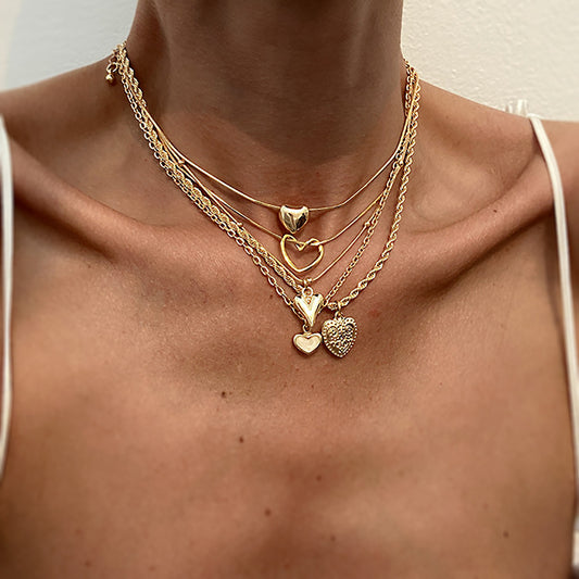 Collar con colgante de aleación en forma de corazón, dulce y atrevido, con detalle de borla para mujer
